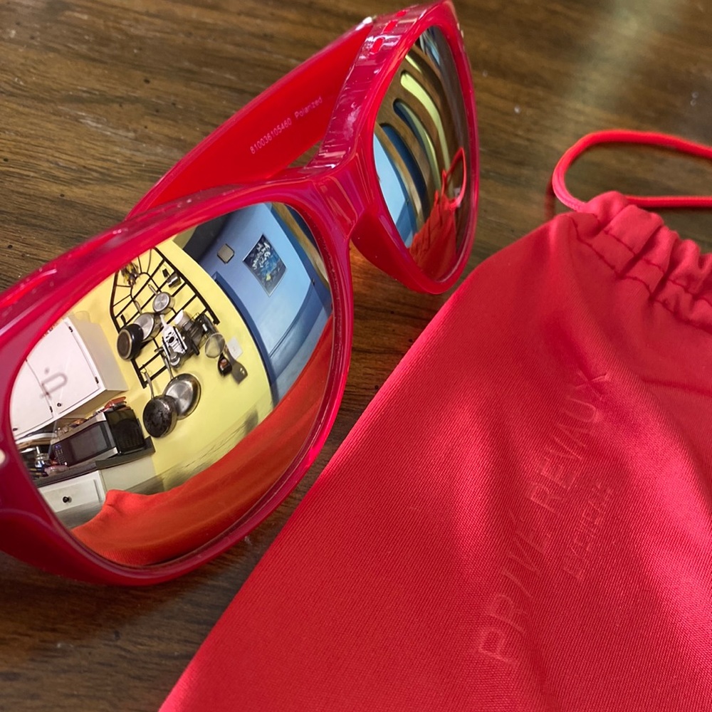 Two Prive Revaux sunglasses, mirrored and polarized.